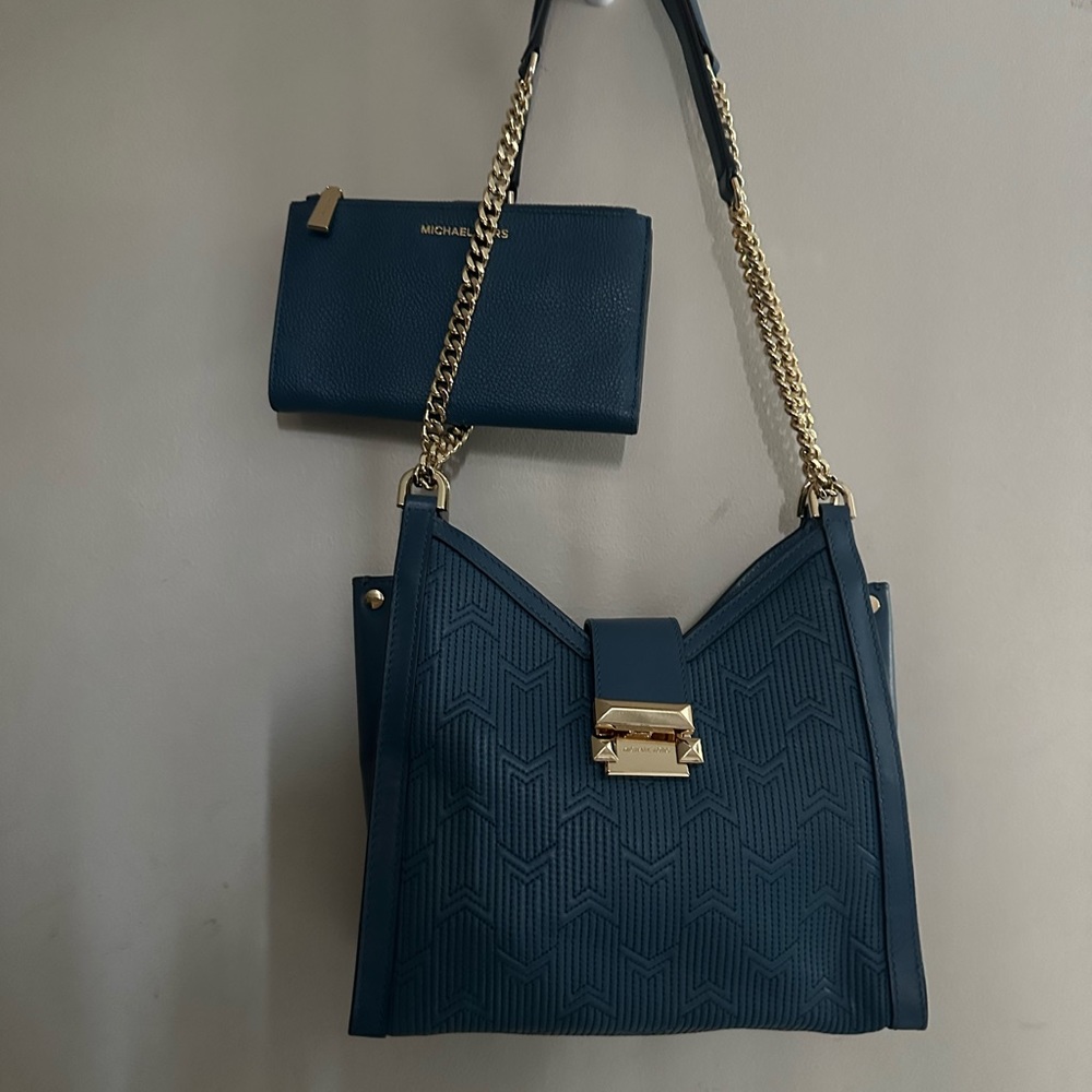 Used Michael kors small shoulder bag.with double zip wallet.